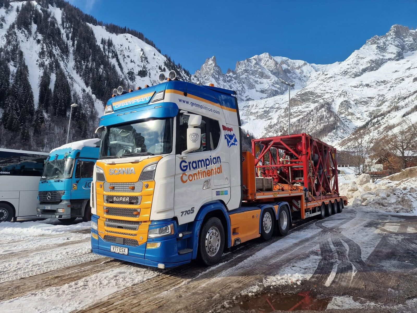 Grampian Continental truck near mountain route bridge